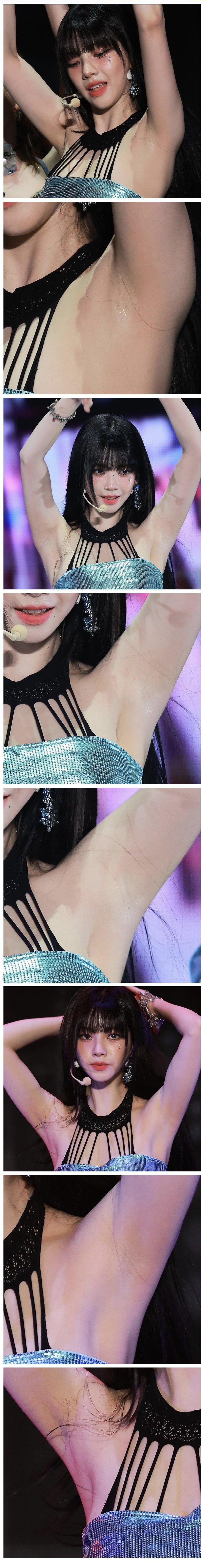 은색 튜브탑 입고 두팔을 든 에스파 카리나